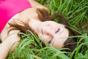 Beautiful Girl Realxing On the Grass