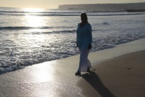 Woman walking on the beach