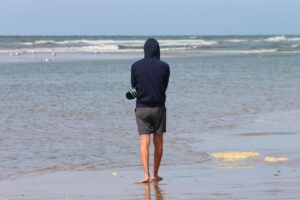 Man walking, the sea