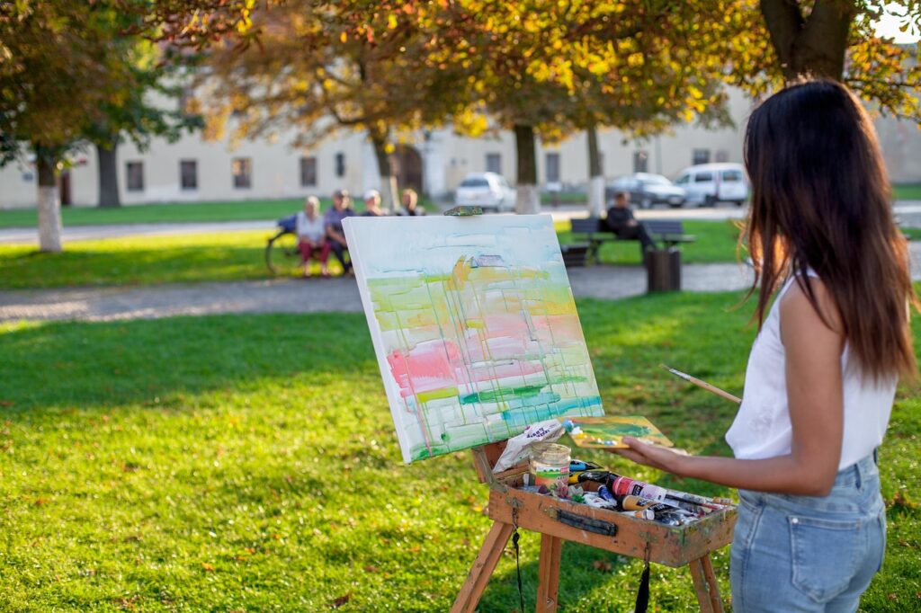 Girl Painting in Park