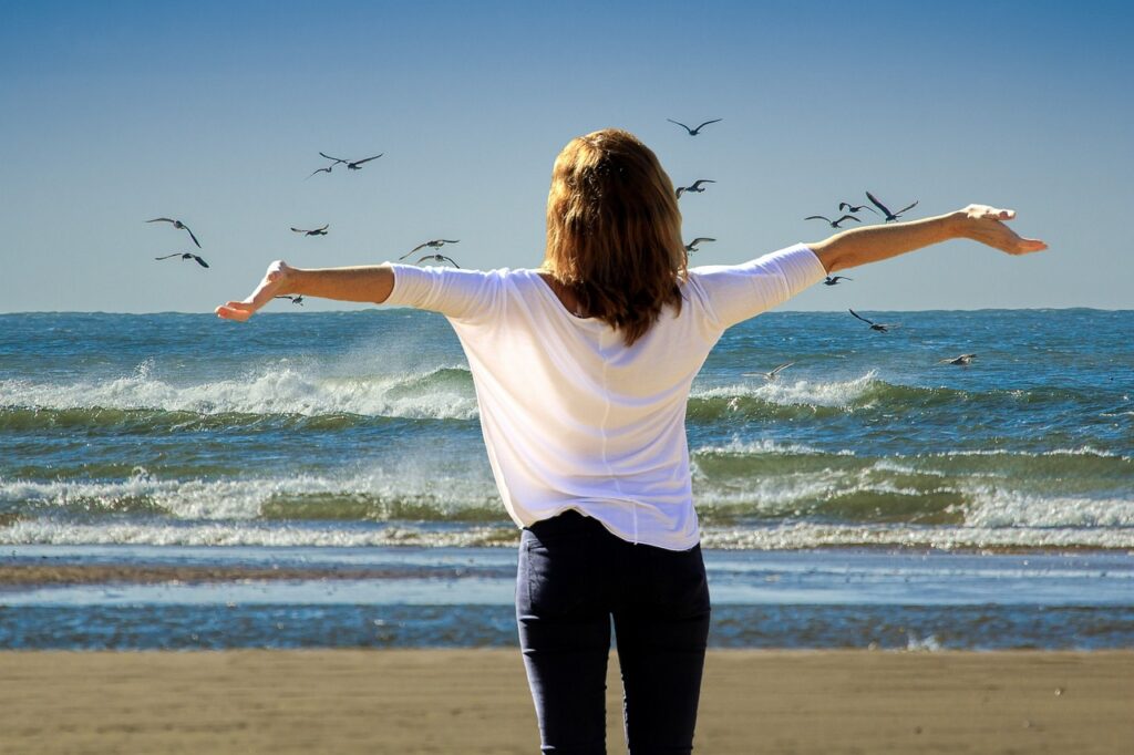 Woman relaxing near sea
